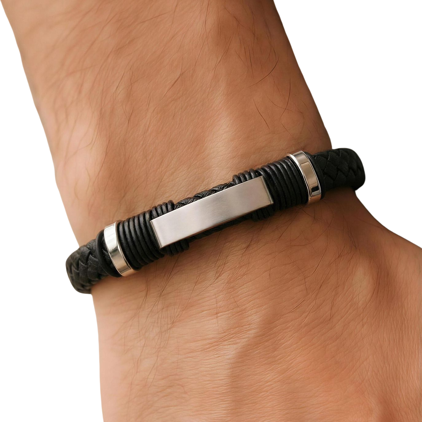 Black leather bracelet with silver bar on a wrist against a white background
