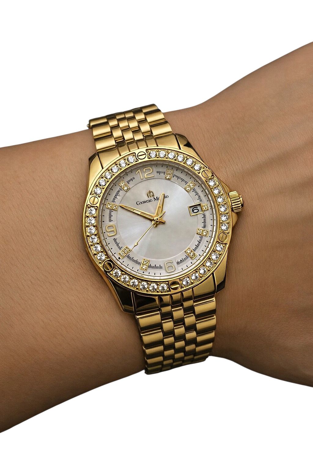 Gold wristwatch with diamond-studded bezel on a wrist against a white background