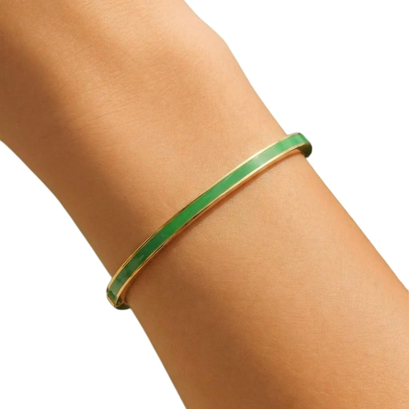Green bracelet on a person's wrist against a white background